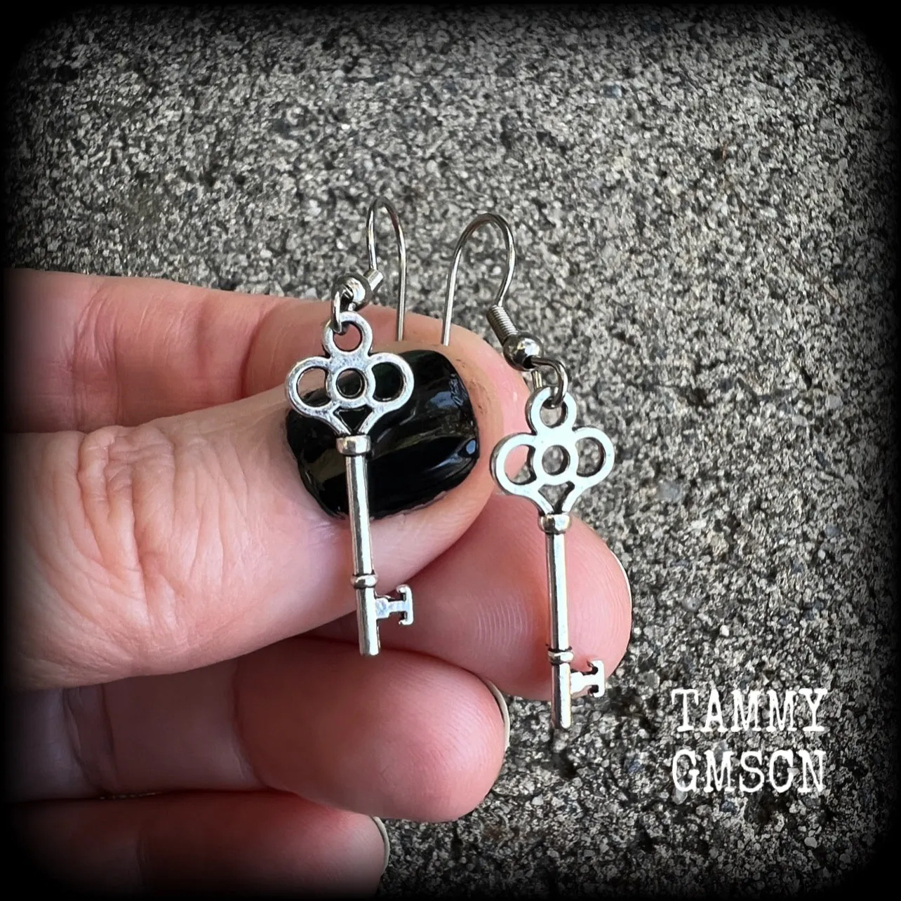 Small antique silver key earrings